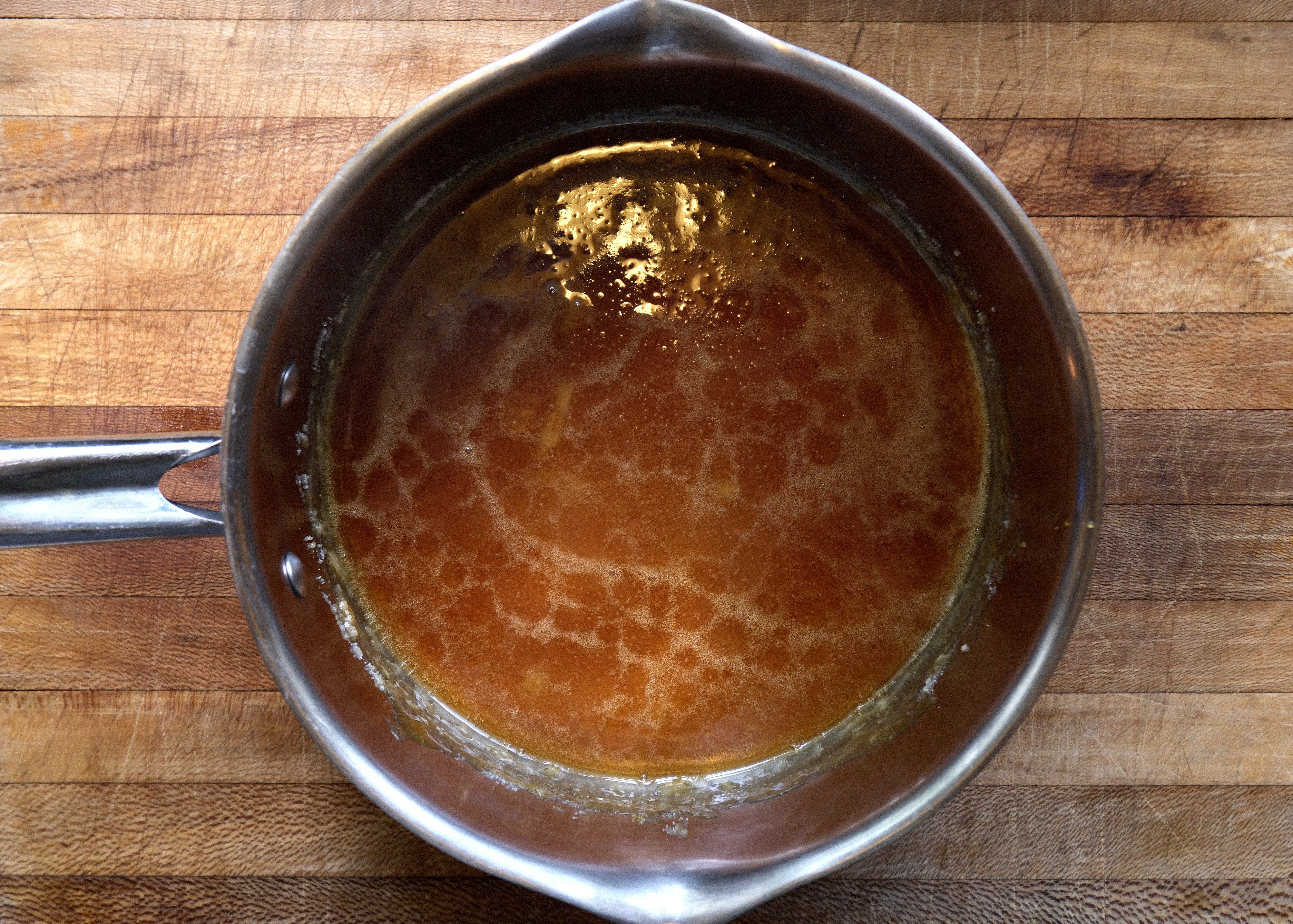 Second stage of amber melted sugar. Creme brûlée coffee syrup.
